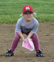 Lily Plumb pink princess playing softball pink cleats pants glove and bat 