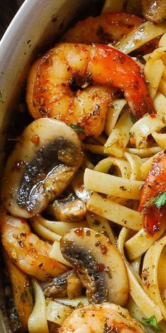 This delicious Pesto Shrimp Fettuccine in Mushroom Garlic Sauce is all about the flavor combination of zesty pesto, garlic, pasta and mushrooms. The best part of the dish is the perfectly cooked shrimp that is sweet and tender and decadent pasta to go with it! Perfectly cooked mushrooms is the essential parts to this Pesto Shrimp Fettuccine dish. Heat is what gives you browning for the mushrooms as well as using plenty of oil to help quickly evaporate any water that mushrooms will sweat out. All you have to do to cook them right is use the hot pan, don’t overcrowd it, add a bit of salt to the mushrooms and resist the urge to move them too soon. You want to get a little browning on the mushrooms by cooking them undisturbed for about 2 minutes. This delicious Pesto Shrimp Pasta is all about the flavor combination of zesty pesto, garlic and mushrooms. The best part is the perfectly cooked shrimp that is sweet and tender. Ingredients Main Ingredients: 2 tablespoons olive oil more if needed 1 lb shrimp peeled and deveined 10 oz white mushrooms sliced 1/2 cup basil pesto 4 garlic cloves minced 1/2 cup sodium free chicken broth (adjust salt if not sodium free) 1/4 teaspoon salt Seasoning Mixture: 1 teaspoon Italian Seasoning (thyme, oregano, basil - combined) 1/4 teaspoon red pepper flakes 1/2 teaspoon paprika 1/2 teaspoon salt chopped fresh basil Pasta: 10 oz fettuccine pasta (use gluten free for gluten free version) Instructions Heat 1 tablespoon of olive oil in a large skillet over medium heat. Put shrimp in a mixing bowl and rub in seasoning mixture. Mix well to make sure shrimp is coated well. Add to the hot pan and cook for about 3 minutes, turning once midway, until shrimp is pink and cooked through. Remove shrimp from the skillet. Add second tablespoon of olive oil to the skillet. Once the pan is hot, add sliced mushrooms and 1/4 teaspoon of salt and cook, stirring, until mushrooms release liquid and reduce in volume and get soft, for about a minute or two. Add minced garlic for the last few minutes, when mushrooms are almost ready. Add back the cooked shrimp. Add 1/2 cup basil pesto and 1/2 cup chicken broth. On medium heat, mix everything to combine. Remove from heat. In the meantime, bring a large pot of water to boil, add pasta and cook it according to instructions. Drain the pasta, but do not rinse. Add pasta to the skillet with mushrooms and shrimp, and stir until pasta is fully coated in sauce. Reheat well on low heat (you can also cover the pan with the lid to retain the heat). Season with more salt if necessary. Serve with additional red pepper flakes, if desired. Recipe Notes Recipe source: Juliasalbum More Deliciouse Recipe Pesto Shrimp Fettuccine in Mushroom Garlic Sauce @ whatsinthepan.com Tweet Share Yum Subscribe to receive free email updates