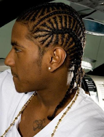 young_black_boy_wearing_cornrow_braids.png