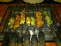 different kebabs on grill at Flame And Grill Restaurant at South City Prince Anwar Shah Road Kolkata