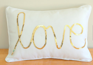 http://www.etsy.com/listing/101491839/gold-sequined-love-cushion?ref=shop_home_active