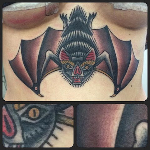 10 Bold Stomach and Sternum Bat Tattoos