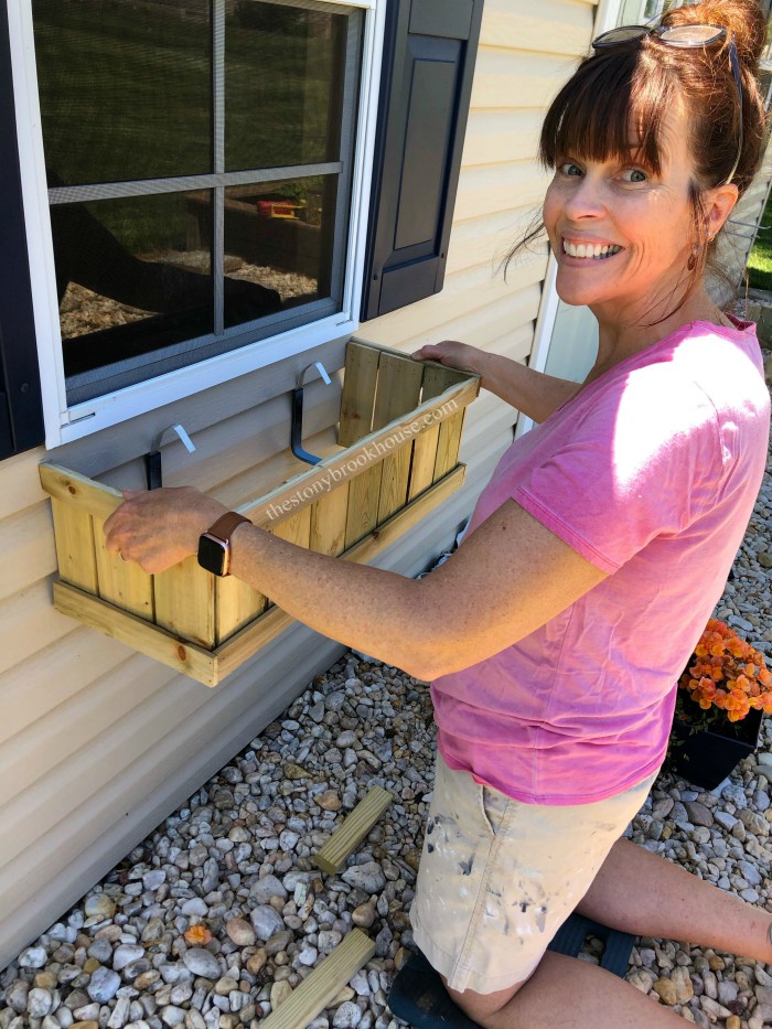 Attaching window boxes to shed