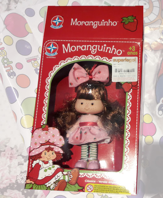 Boneca Moranguinho na caixa