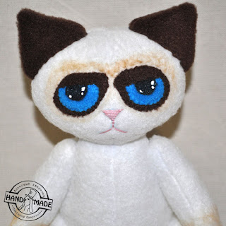 сердитый кот игрушка