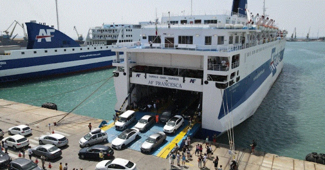 Passengers getting off a ferry in the port of Durres