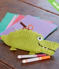 http://www.yarnspirations.com/pattern/crochet/alligator-pencil-case