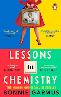 Cover of Lessons in Chemistry showing a headless woman in a red dress holding a TV