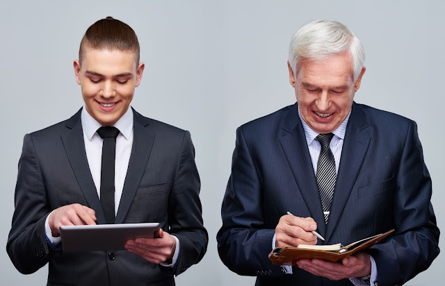 Youg Man in Suit nad Tie With laptop, Older Man in Suit and Tie with Notepad and Pencil