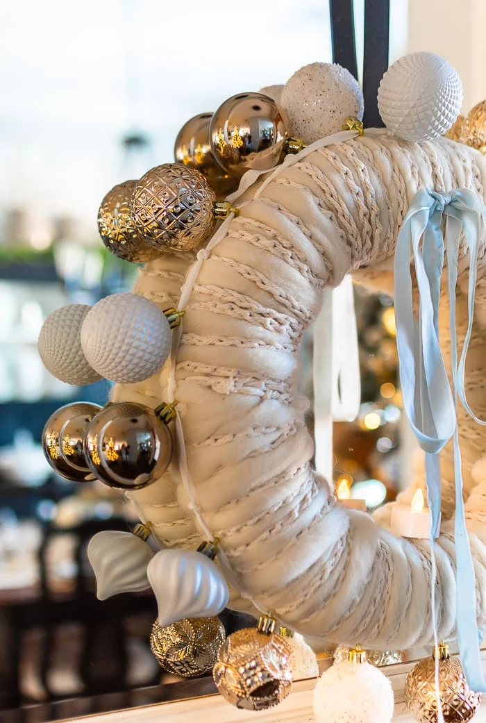 cozy wreath, ornaments, velvet ribbon, mirror