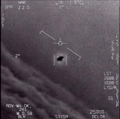 UAP photo still shows an unknown craft being Chased by a US Air Force Jet.