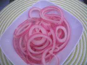 bowl with sliced pickled onions