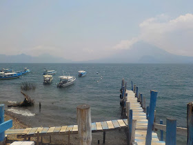 Lake Atitlan with boats and dock Guatemala