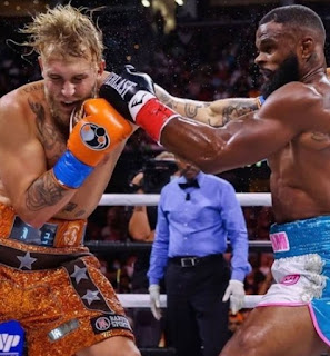 Picture of boxing between Tyron Woodley & Jake Paul