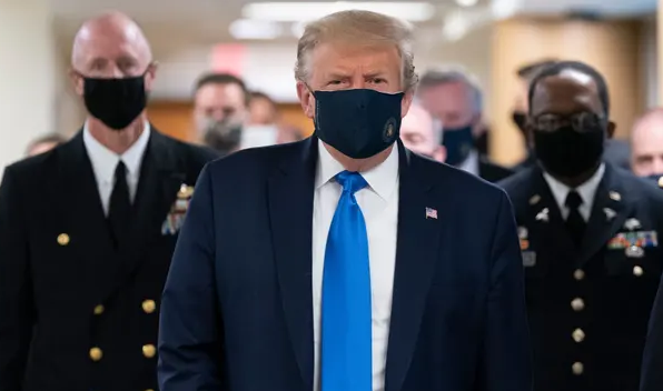 Donald Trump wears Face mask in public for first time during Covid-19
