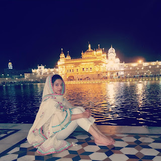 Mehreen Pirzada in White Dress with Cute Smile at Golden Temple 1