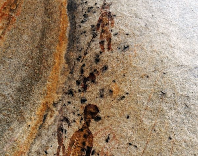 Alien in Indian cave painting.