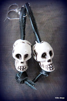 Lovelea's skull earrings