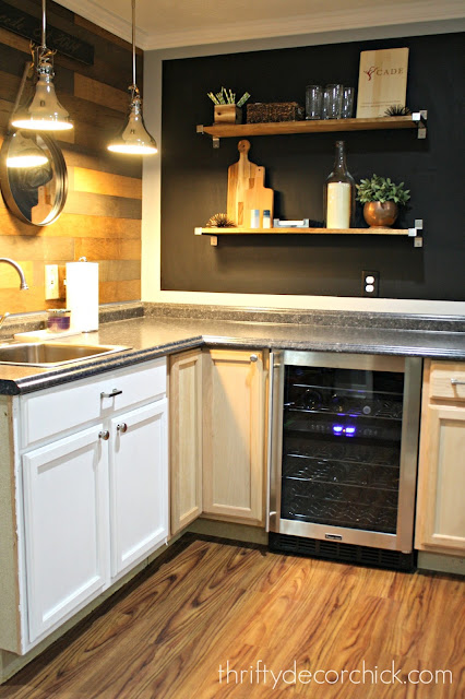 Industrial kitchenette with wood tones