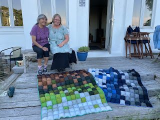 Carol and Lotte with "puff" quilts Carol made for Lotte