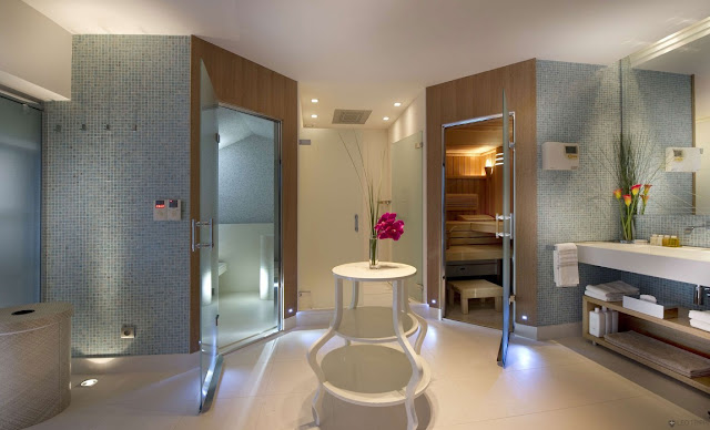Large modern bathroom with separated shower cabin and toilet 