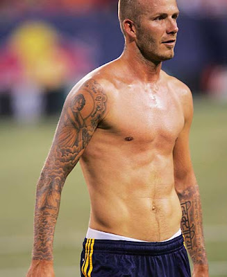 David Beckham tem os nomes dos tr s filhos tatuados Brooklyn Romeo e Cruz 
