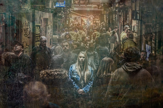 Woman feeling alone in a crowd of people