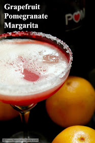 A recipe for a seasonal winter holiday cocktail--fresh grapefruit blended in a margarita and finished with a splash of pomegranate juice.