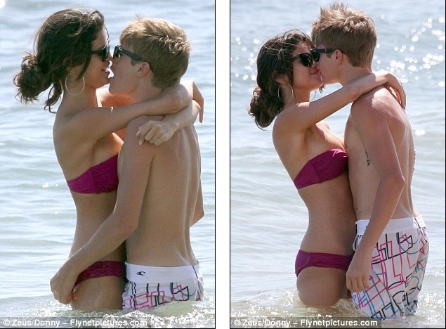 justin bieber getting shot in the head. Gissa kiss: Bieber leans into