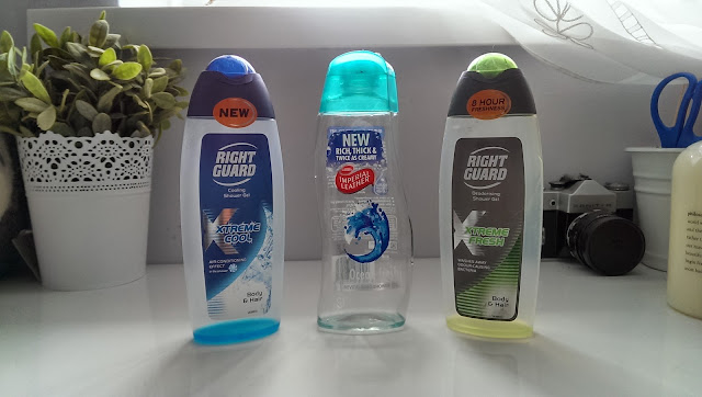 A picture of three empty shower gel bottles (right guard x 2 and imperial leather)