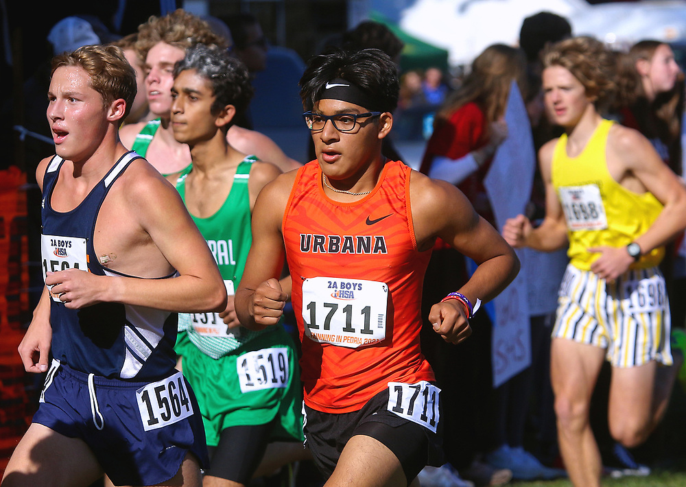 Julio Angrave runs at the IHSA State cross country meet in 2021