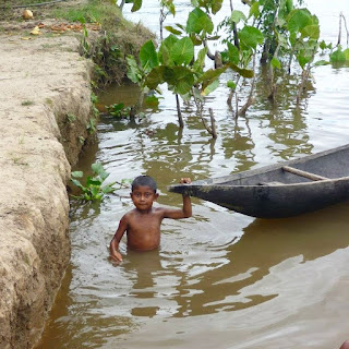 Warao boy swims and plays in the Orinoco River