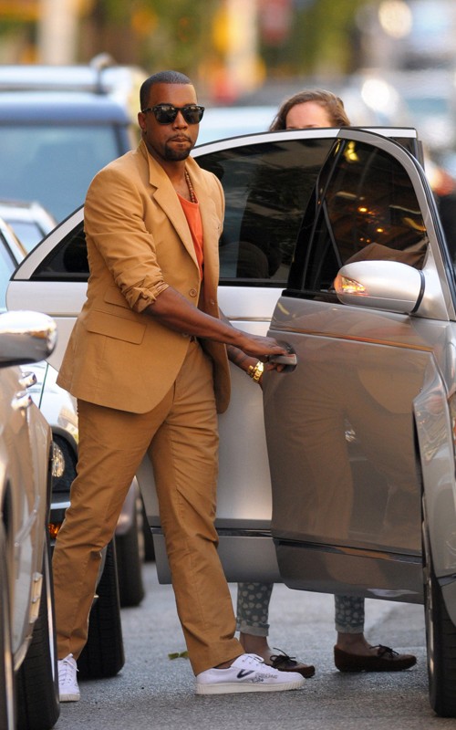 kanye west glasses white. Kanye West in Camel Prada Suit