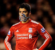 Liverpool accept £35m bid for Suarez from Borussia Munchonacentreback (suarezmuzzle)