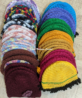 Sweet Nothings Crochet free crochet pattern blog, free crochet pattern for a unisex chemo cap, photo of all caps made for the donation,