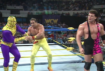 WCW Starrcade 1991 - Firebreaker Chip works over Archnaman's arm