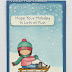 Winter card with a little girl and a sled