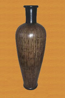 Antique flower vase of rattan cut