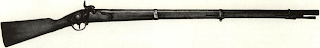 Garibaldi rifles were strongly made but clumsy, and non-standard .71 caliber. Records state only 5995 Garibaldi rifles were purchased. Style similar to Lorenz Jaeger carbine but barrel is round and special front band holds ramrod.