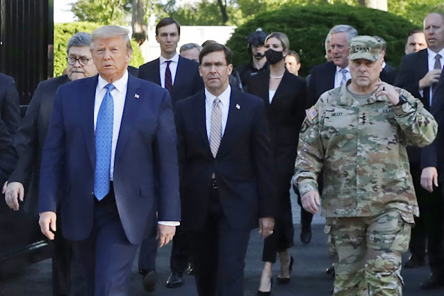 President Trump walks to St. John’s Episcopal Church on June 1 with Atty. Gen. William Barr, Defense Secretary John Esper and Gen. Mark Milley.