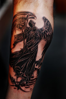Grim Reaper / Angel of Death tattoo: winged angel of death wearing a hooded black cloak