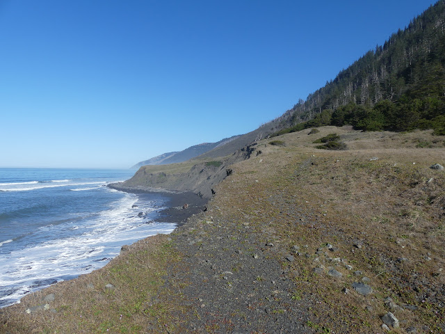 track that was once a road falling into the sea