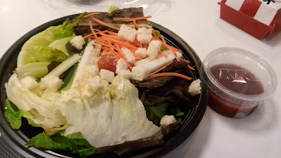 KFC's premium salad that costs Php 120, bigger serving plus additional croutons and- I think these are- turnips/singkamas.