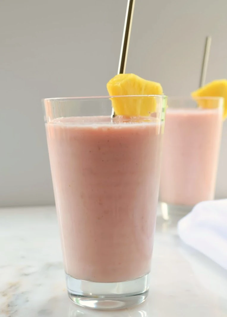 Strawberry Pineapple Raspberry Banana Smoothies are a family favorite for busy mornings from Serena Bakes Simply From Scratch.