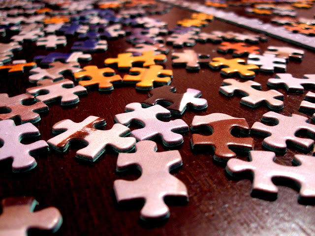 Close up of puzzle pieces on a table