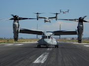 A line of MV22 Osprey aircraft from Marine Medium TiltRotor Squadron 266 . (ebc)