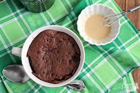 Ready in less than 3 minutes, this Bailey's Nutella Mug Cake is a fudgy, yet fluffy chocolate cake for one that is drizzled with a simple Irish cream glaze.