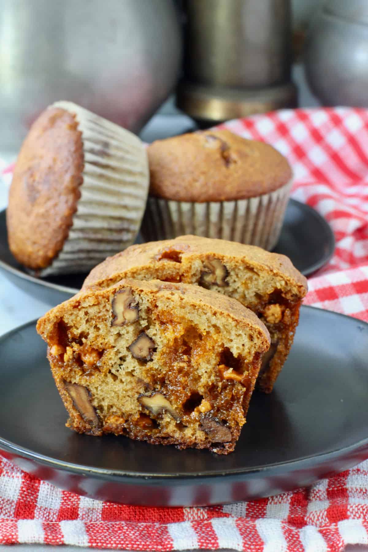 Pecan Butterscotch Muffins cut in half to show the crumb.