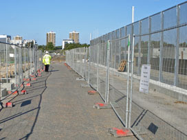 inattentive guard on fenced-off Greenway