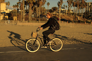 Balck Friday and male rides a bike